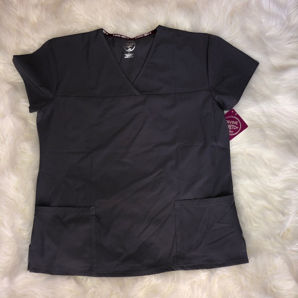 Women’s scrubs top, size: large. New with tags